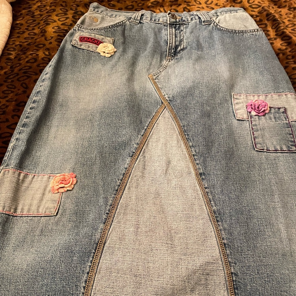 Blue denim skirt with patches , embroidery and crochet flowers